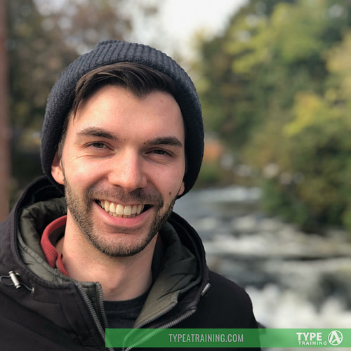 a man smiling for the camera