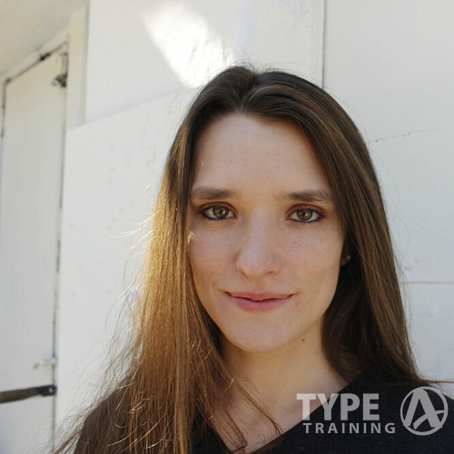 a woman with long hair smiling