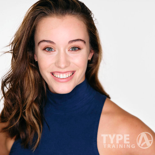 a woman smiling at the camera