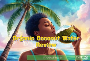 a woman drinking from a coconut