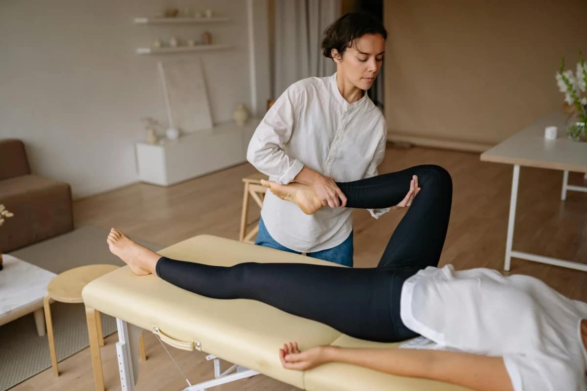 a woman getting a leg massage