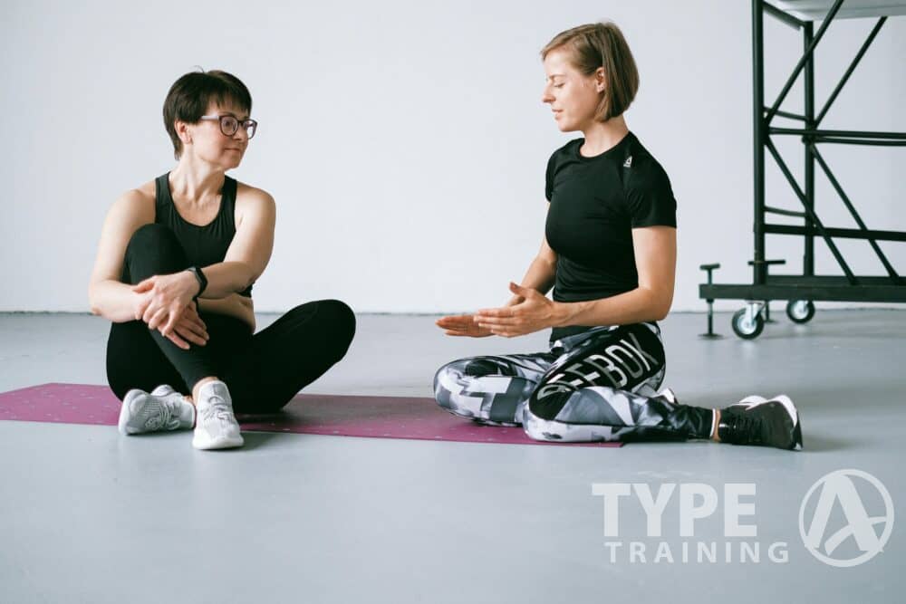 Senior talking with trainer scaled e1694406952166